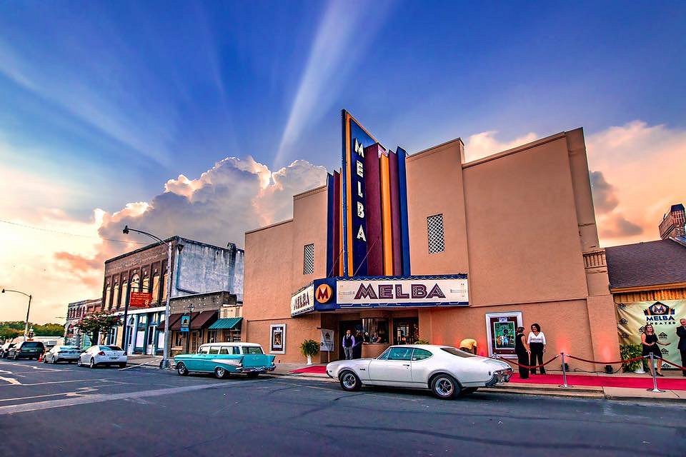The historic Melba Theater at sunset